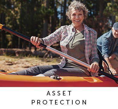 A senior couple enjoying their canoe ride because they put their trust in Outlook Wealth Advisors to take care of their retirement financial strategy.